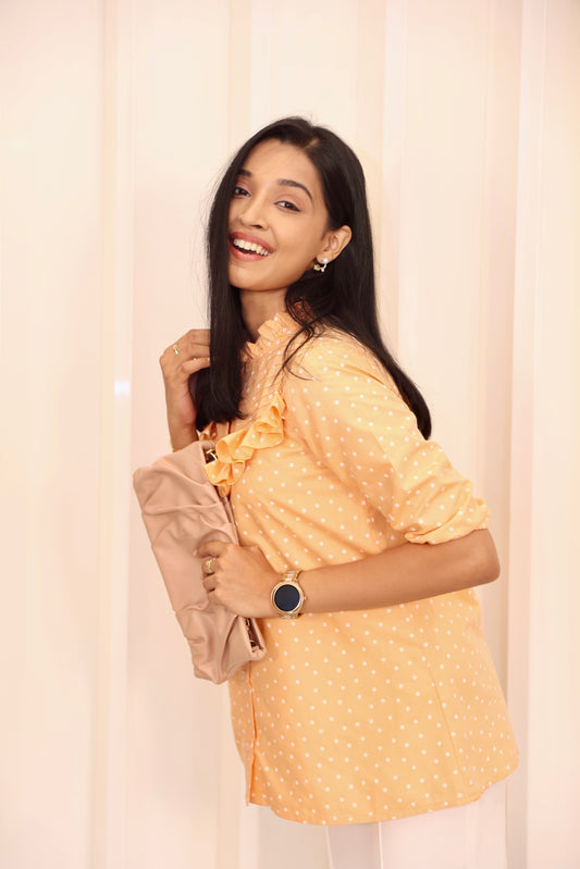 Orange polka dot shirt