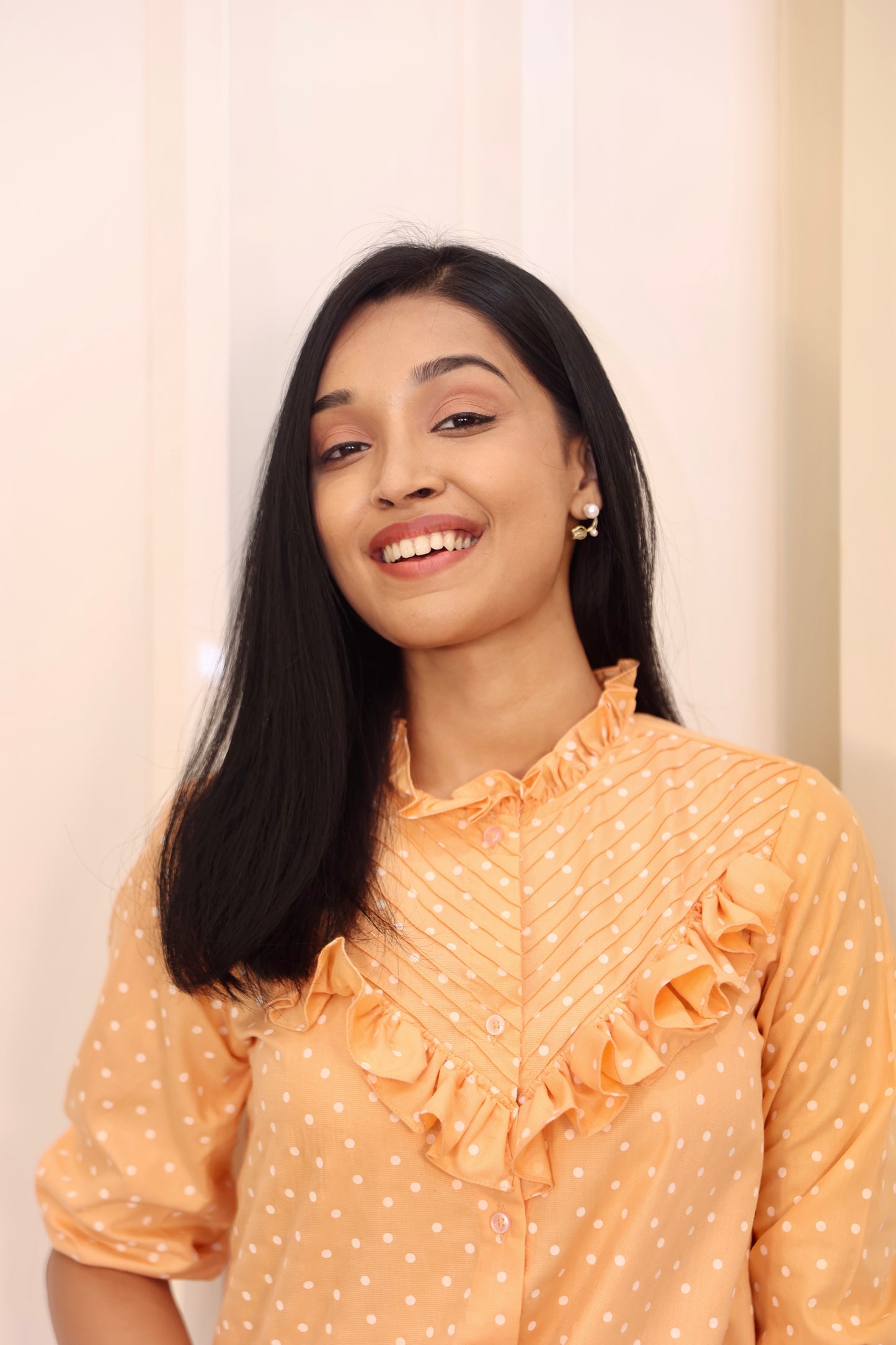 Orange polka dot shirt
