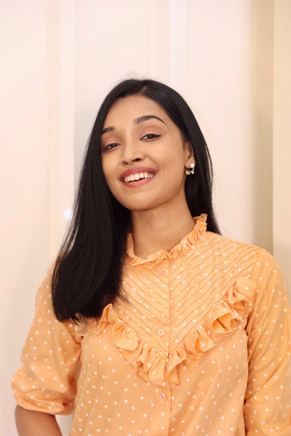 Orange polka dot shirt