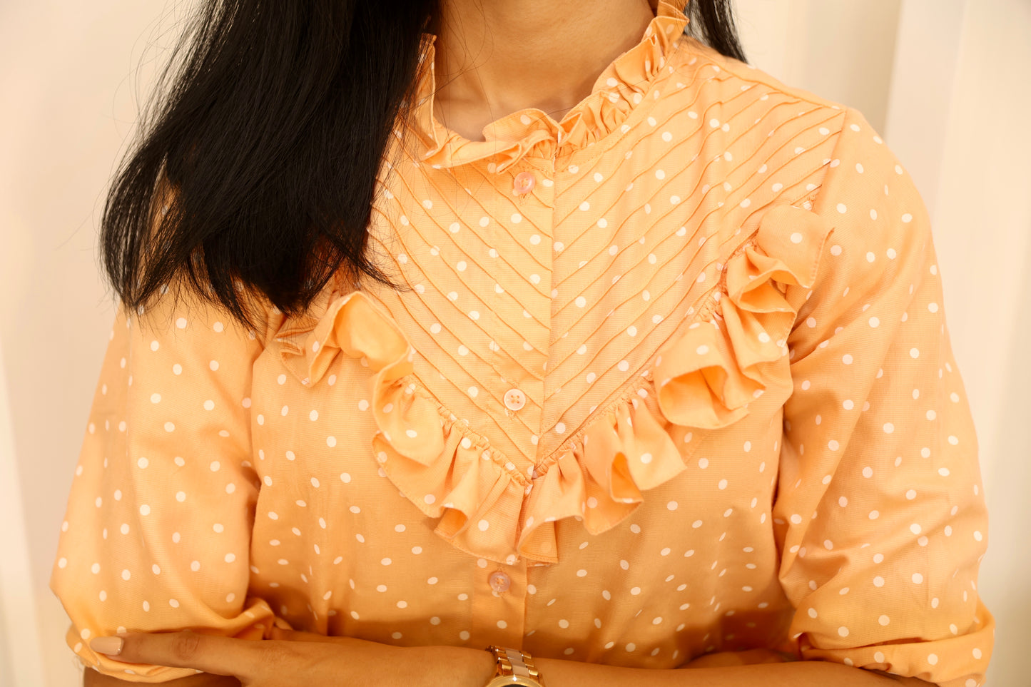 Orange polka dot shirt